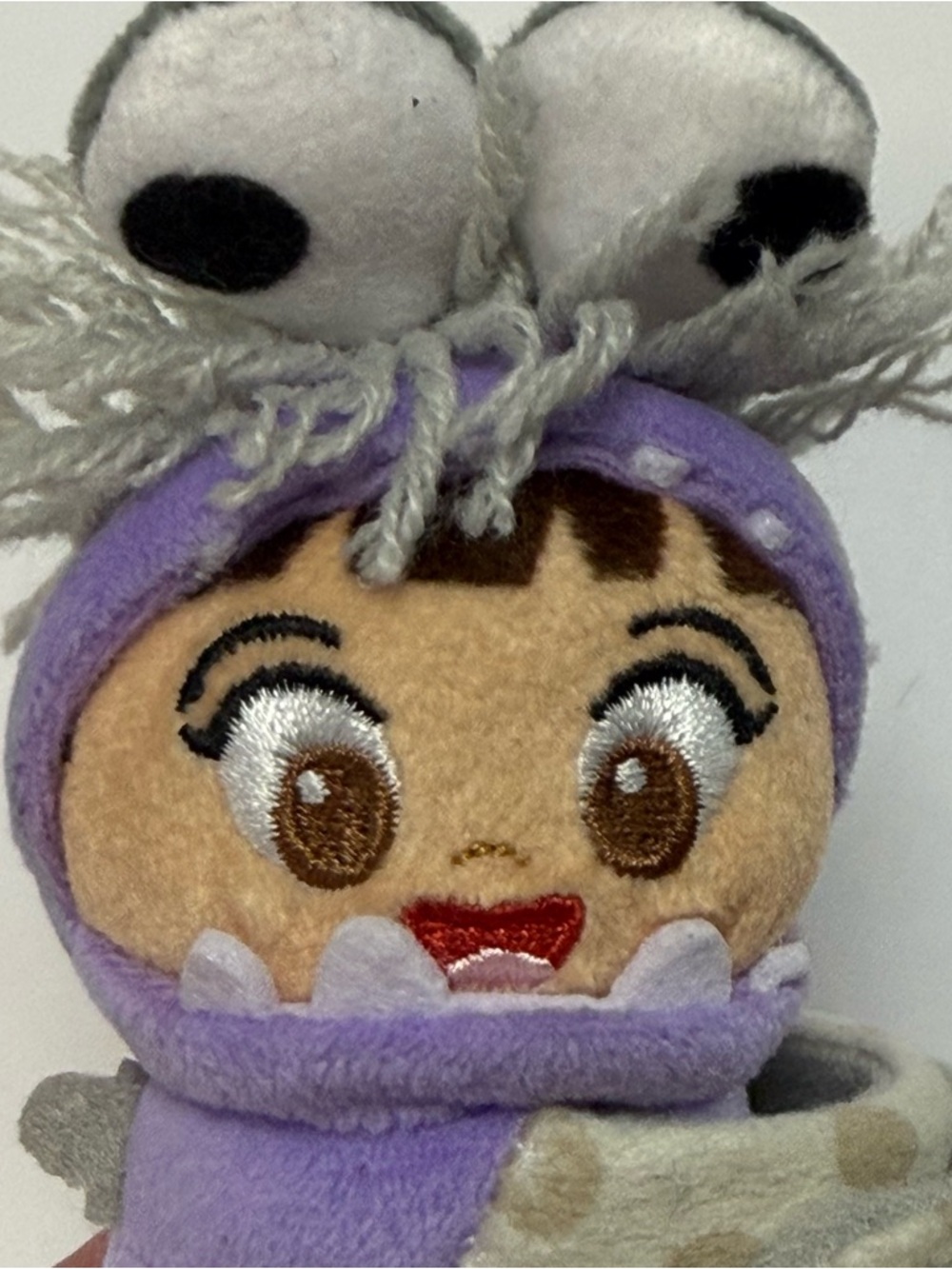 Disney Pixar Monster’s Inc. Cutie Cuff Bullsitoy Boo Plush Wrist Toy Purple EUC